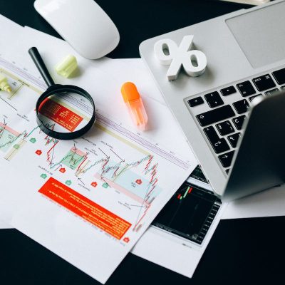 Black Magnifying Glass on White Paper